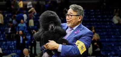 Kaz Hosaka and Sage, after their win at the 2024 Westminster Dog Show. (Photo via Purina Pro Club.)